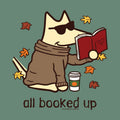 A stylized cartoon fox wearing dark sunglasses, a brown sweater, and a scarf, sitting and reading an open red book. Yellow and orange autumn leaves float around it, with a takeaway coffee cup and the text 'all booked up' below on a muted green background.