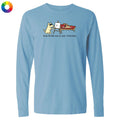 Light blue long-sleeve shirt with a cartoon design of a dog drawing another dog on a white background.