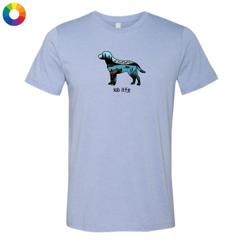 A light heather blue short-sleeve t-shirt with a graphic of a dog cut into colorful geometric sections and the text 'lab life' underneath, displayed on a solid white background.